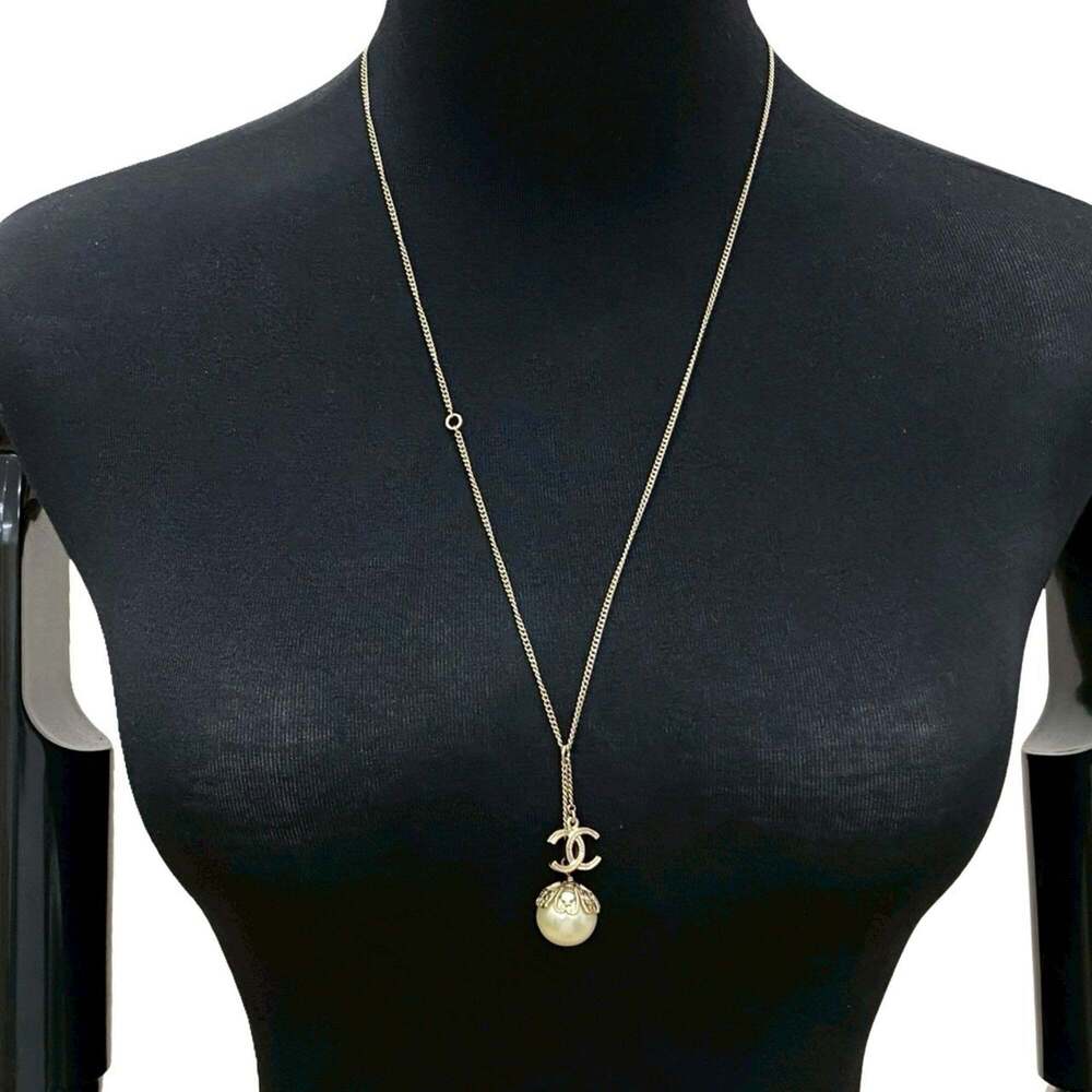 CHANEL Gold Pearl Logo Necklace - Picture 1 of 4